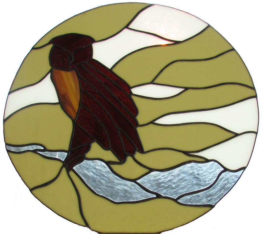 stained glass owl on tree branch with moon